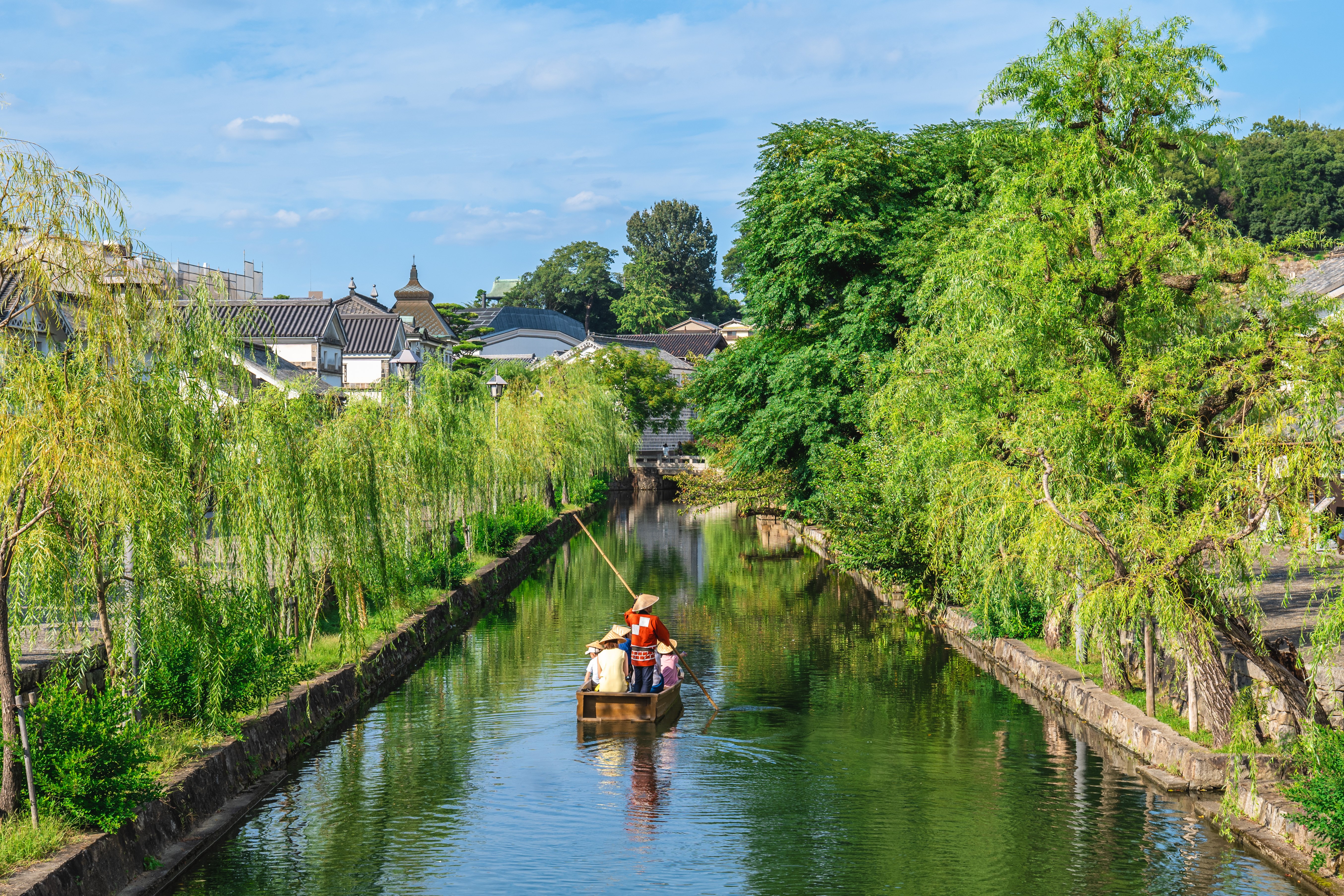 Kurashiki Bikan Historical Quarter canal lined with white-walled storehouses