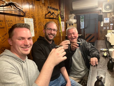 Drinking sake in a small bar with locals